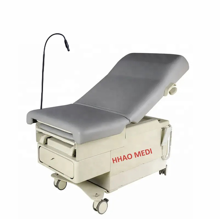 Midmark Ritter similar type electric gynecological chair with drawers and lamp